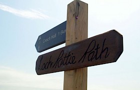 Signpost for the Loch Pottie Path